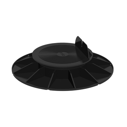 Socle circulaire en plastique noir avec centre nervuré surélevé et ailette verticale, diamètre estimé 10 cm, posé sur fond blanc. Référence non visible.